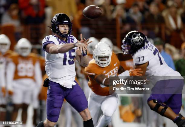 Max Duggan of the TCU Horned Frogs throws a pass in the first half against the Texas Longhorns at Darrell K Royal-Texas Memorial Stadium on November...