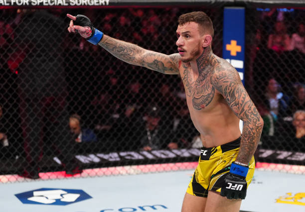 Renato Moicano of Brazil reacts after his submission victory over Brad Riddell of New Zealand in a lightweight bout during the UFC 281 event at...