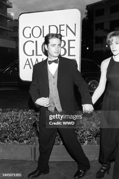 Outtake; Actors Jason Priestley and Christine Elise at the Golden Globe Awards at the Beverly Hilton on January 22, 1995 in Beverly Hills,...