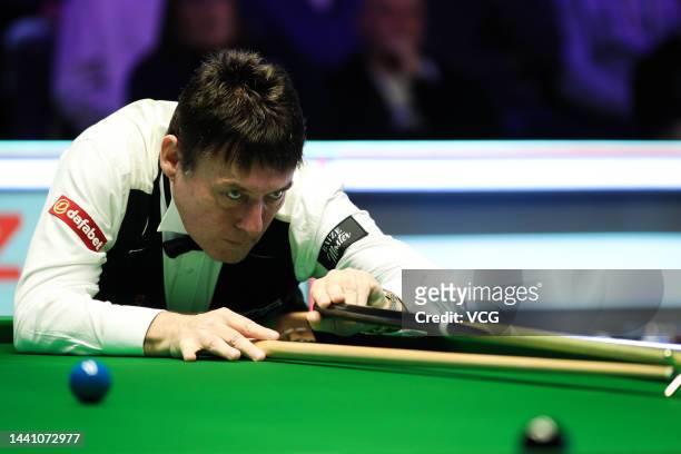 Jimmy White of England plays a shot during the first round match against Ryan Day of Wales on day 1 of 2022 Cazoo UK Championship at Barbican Centre...