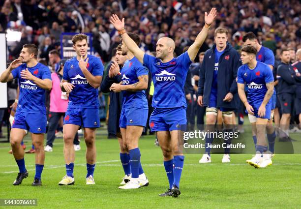 Maxime Lucu of France and teammates celebrate the victory with the supporters following the Autumn Nations Series international test match between...