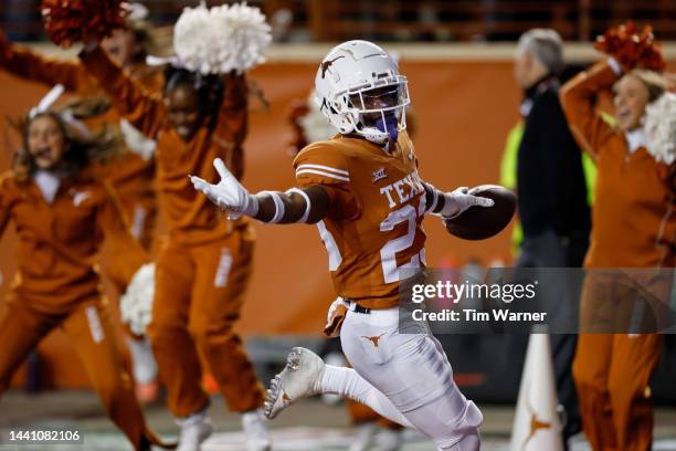 Jahdae Barron of the Texas Longhorns scores a touchdown in the fourth quarter against the TCU Horned Frogs at Darrell K Royal-Texas Memorial Stadium...