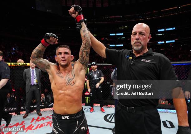 Dustin Poirier reacts after his submission victory over Michael Chandler in a lightweight bout during the UFC 281 event at Madison Square Garden on...