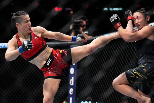 Zhang Weili of China kicks Carla Esparza in the UFC strawweight championship bout during the UFC 281 event at Madison Square Garden on November 12,...