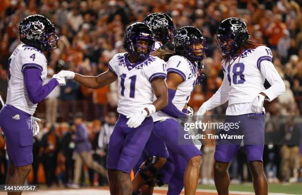 The TCU Horned Frogs celebrate after a touchdown reception by Quentin Johnston in the second half at Darrell K Royal-Texas Memorial Stadium on...