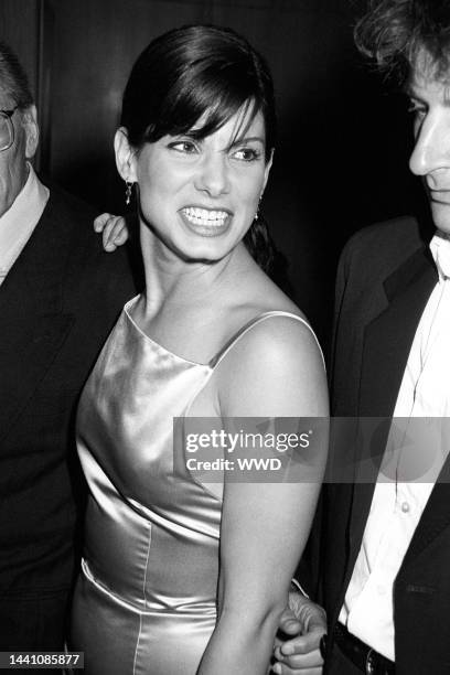 Irwin Winkler and Sandra Bullock at the Beverly Hills premiere of <The Net>.