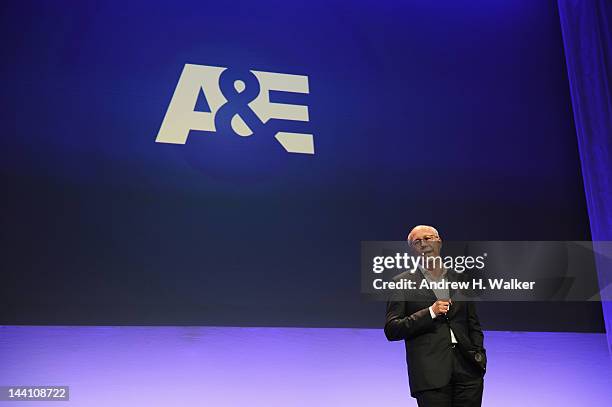 President and General Manager, A&E Network and BIO, Robert DeBitetto speaks on stage at the A&E Networks 2012 Upfront at Lincoln Center on May 9,...