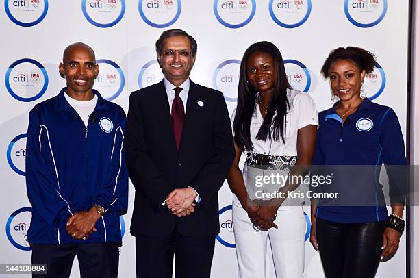 Meb Keflezighi, Vikram Pandit, Kari Miller and Dominique Dawes pose for a photo at an event to celebrate Citi’s Team USA sponsorship and mark its...