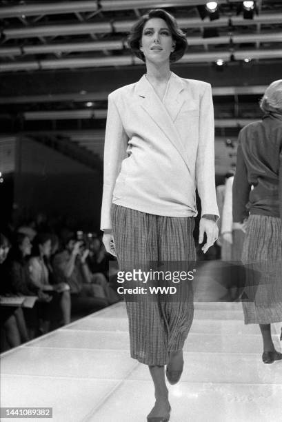 Wrapped blazer with cropped striped pants from Armani's Spring 1984 RTW collection