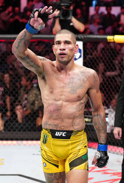 Alex Pereira of Brazil reacts after his TKO victory over Israel Adesanya of Nigeria in the UFC middleweight championship bout during the UFC 281...