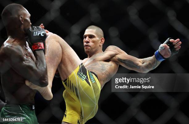 Alex Pereira lands a kick on Israel Adesanya during their Middleweight fight at UFC 281 at Madison Square Garden on November 12, 2022 in New York...
