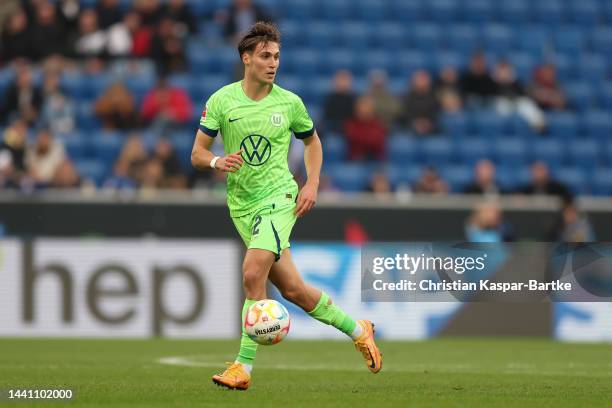 Kilian Fischer of VfL Wolfsburg in action during the Bundesliga match between TSG Hoffenheim and VfL Wolfsburg at PreZero-Arena on November 12, 2022...