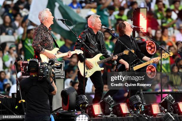 Paul Gildea and Iva Davies of Icehouse perform ahead of the ICC Men's T20 World Cup Final match between Pakistan and England at the Melbourne Cricket...