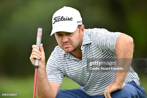 Richard Sterne of South Africa prepares to make his putt shot from the 1st hole during Day Four of the Nedbank Golf Challenge at Gary Player CC on...