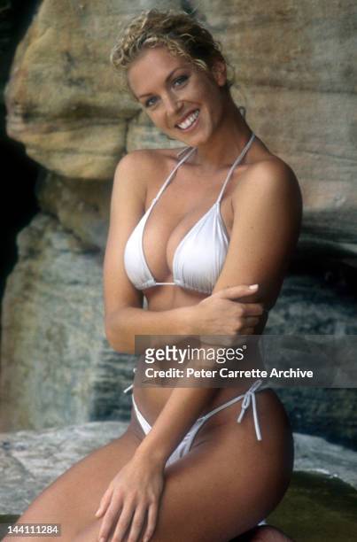 1990s: Australian model Annalise Braakensiek during a photo shoot at Bondi Beach in the 1990s in Sydney, Australia.