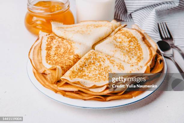 french pancakes, plate of delicious pancakes. - crepe stock pictures, royalty-free photos & images