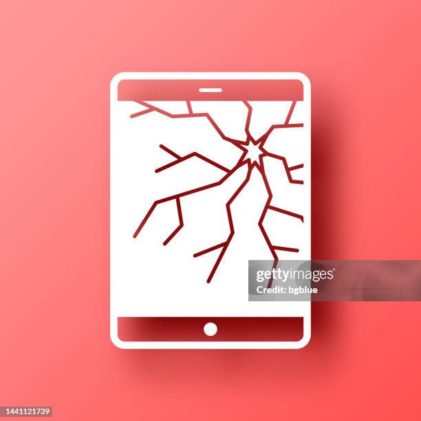 tablet pc with broken screen. icon on red background with shadow - broken tablet screen stock illustrations