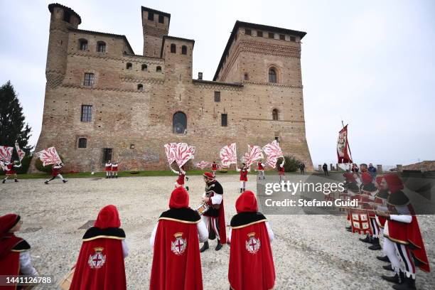 Flag wavers attends the 22nd World Alba White Truffle Auction on November 13, 2022 in Alba, Italy. Since 1999, the Grinzane Cavour Castle has hosted...