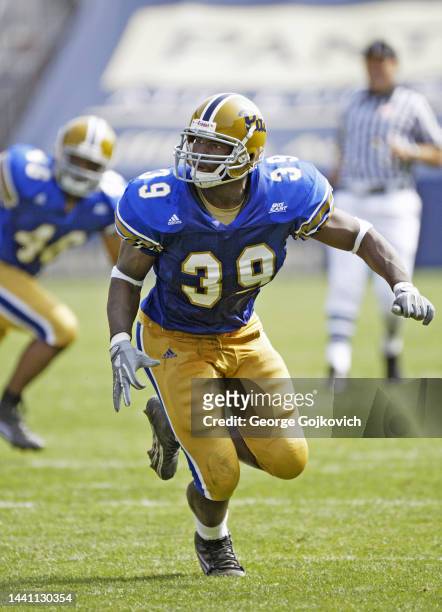 Linebacker Derron Thomas of the University of Pittsburgh Panthers pursues the play against the Youngstown State Penguins during a college football...