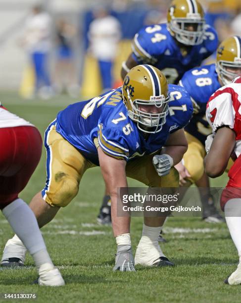 Offensive lineman Mike McGlynn of the University of Pittsburgh Panthers looks on from the line of scrimmage during a college football game against...
