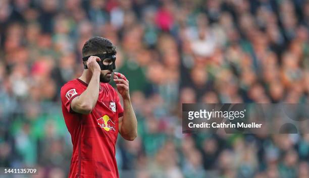 Josko Gvardiol of RB Leipzig wearing a mask during the Bundesliga match between SV Werder Bremen and RB Leipzig at Wohninvest Weserstadion on...