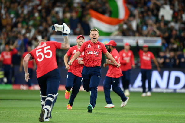 Ben Stokes and Sam Curran of England celebrate winning the ICC Men's T20 World Cup Final match between Pakistan and England at the Melbourne Cricket...