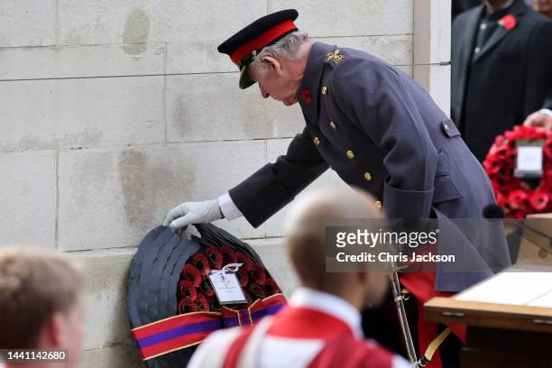 King Charles III lays a wreath during the National Service Of Remembrance at The Cenotaph on November 13, 2022 in London, England.
