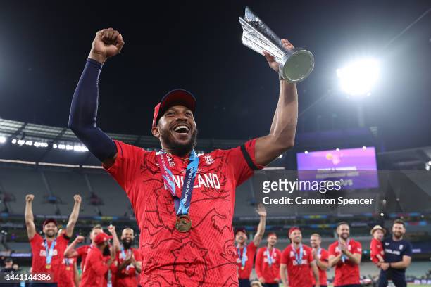 Chris Jordan of England celebrates victory with the T20 World Cup trophy following the ICC Men's T20 World Cup Final match between Pakistan and...