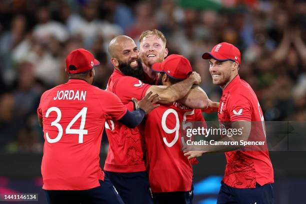 Chris Jordan, Moeen Ali, Ben Stokes, Adil Rashid and Phil Salt of England celebrate victory following the ICC Men's T20 World Cup Final match between...