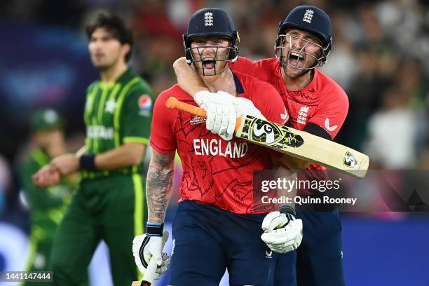 Ben Stokes and Liam Livingstone of England celebrate winning the ICC Men's T20 World Cup Final match between Pakistan and England at the Melbourne...