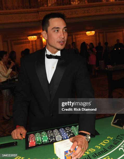 Chicago Cubs Darwin Barney deals Blackjack during the 2012 Dempster Foundation casino night at Palmer House Hotel on May 9, 2012 in Chicago, Illinois.