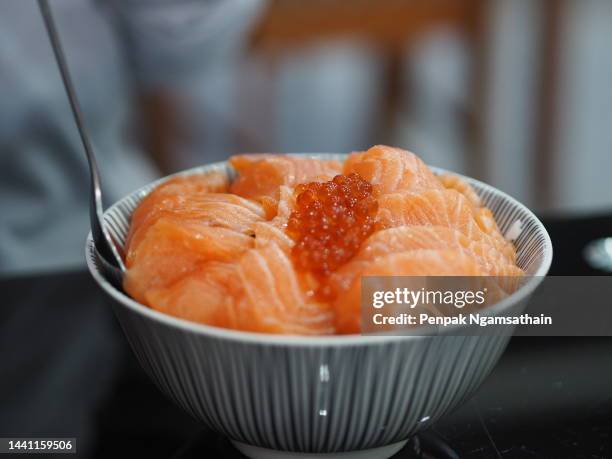 salmon sashimi salmon roe, ikura don in bowl fish seafood - ikura stock pictures, royalty-free photos & images
