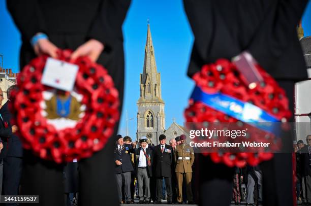 Wreaths are seen at the Remembrance Day service and wreath laying at the Cenotaph, on November 13, 2022 in Weymouth, England.