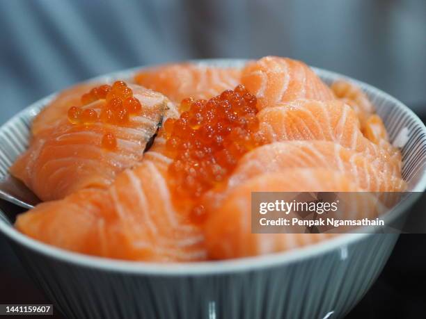 salmon sashimi salmon roe, ikura don in bowl fish seafood - ikura stock pictures, royalty-free photos & images