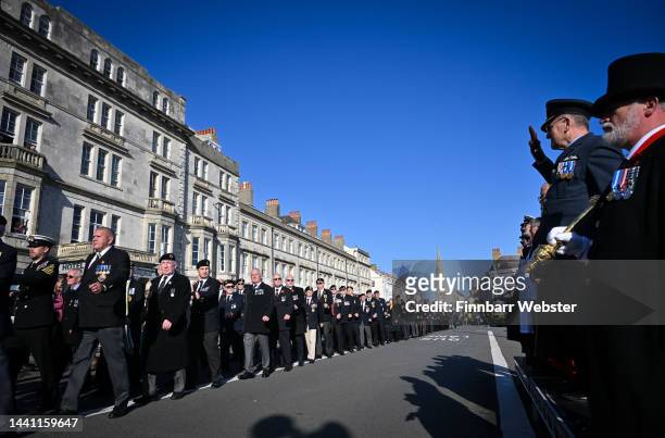 Veterans parade after the Remembrance Day service and wreath laying at the Cenotaph, on November 13, 2022 in Weymouth, England.