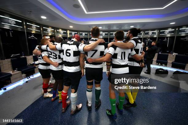 Barbarian players speak in a huddle ahead of the Killik Cup match between Barbarians and New Zealand All Blacks XV at Tottenham Hotspur Stadium on...