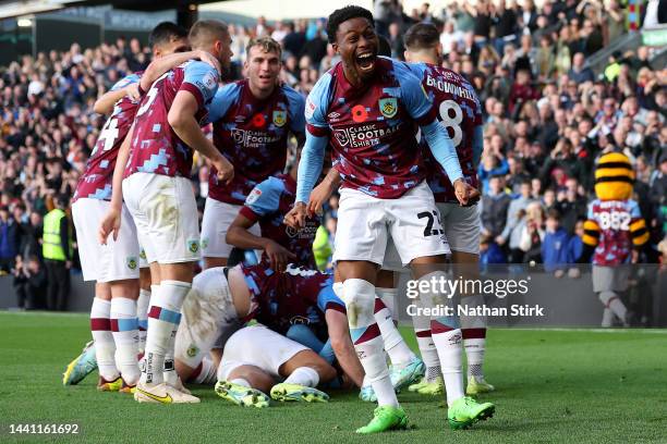 Nathan Tella of Burnley celebrates after teammate Anass Zaroury scores their side's second goal during the Sky Bet Championship between Burnley and...