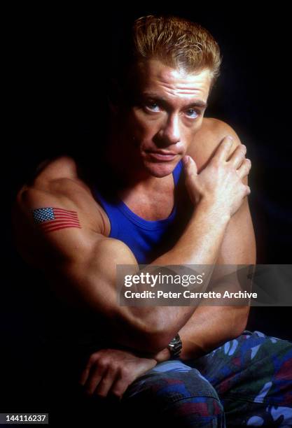 Belgian actor Jean-Claude Van Damme poses in character as 'Colonel Guile' from his upcoming film 'Street Fighter' on July 21, 1994 on the Gold Coast,...