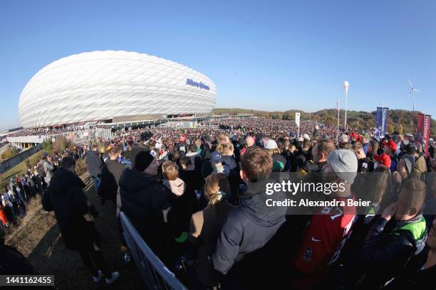 Visitors line up at the entrances of the Allianz Arena stadium to attend the NFL match between Seattle Seahawks and Tampa Bay Buccaneers at Allianz...