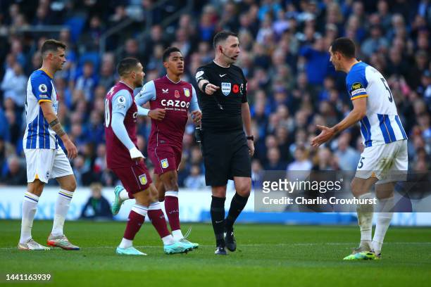 Lewis Dunk of Brighton & Hove Albion appeals to Referee, Chris Kavanagh during the Premier League match between Brighton & Hove Albion and Aston...