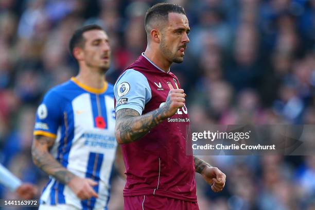 Danny Ings of Aston Villa celebrates after scoring their side's first goal from the penalty spot during the Premier League match between Brighton &...