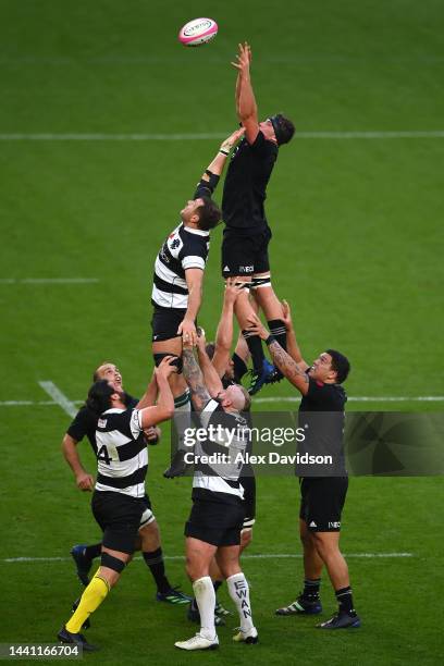 Dominic Gardinier of New Zealand and Luke Whitelock of Barbarians battle for lineout ball during the Killik Cup match between Barbarians and New...