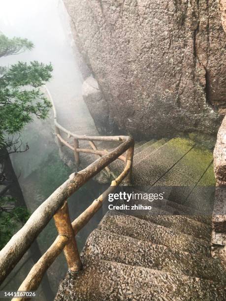 stone path of huangshan mountain in the fog - huangshan city anhui province stock pictures, royalty-free photos & images