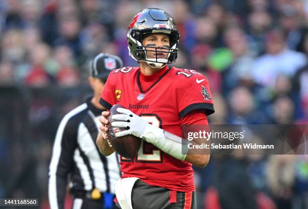 Tom Brady of the Tampa Bay Buccaneers prepares to throw a pass during the NFL match between Seattle Seahawks and Tampa Bay Buccaneers at Allianz...