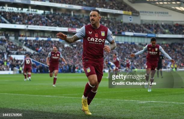 Danny Ings of Aston Villa celebrates after scoring their side's second goal during the Premier League match between Brighton & Hove Albion and Aston...