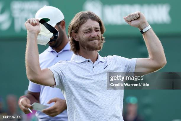 Tommy Fleetwood of England celebrates after winning the Nedbank Golf Challenge on the 18th hole during Day Four of the Nedbank Golf Challenge at Gary...