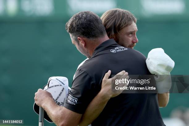 Ryan Fox of New Zealand shake hands with Tommy Fleetwood of England on the 18th hole during Day Four of the Nedbank Golf Challenge at Gary Player CC...