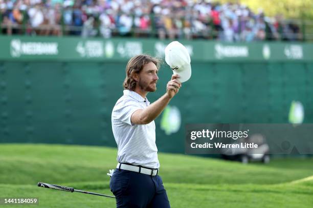 Tommy Fleetwood of England celebrates after winning the Nedbank Golf Challenge on the 18th hole during Day Four of the Nedbank Golf Challenge at Gary...