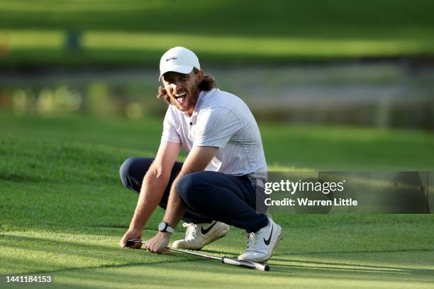 Tommy Fleetwood of England reacts after his third shot on the 18th hole during Day Four of the Nedbank Golf Challenge at Gary Player CC on November...