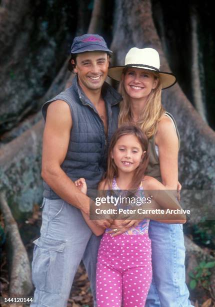 1990s: Australian actress and singer Olivia Newton-John with her husband Matt Lattanzi and their daughter Chloe in the garden of their home in the...